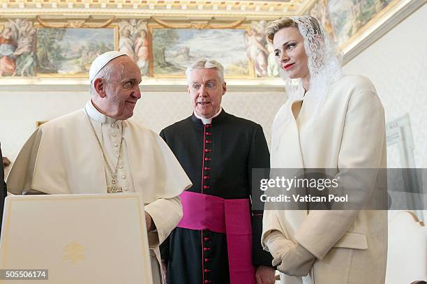 Pope Francis exchanges gifts with Princess Charlene of Monaco at the Apostolic Palace on January 18, 2016 in Vatican City, Vatican.