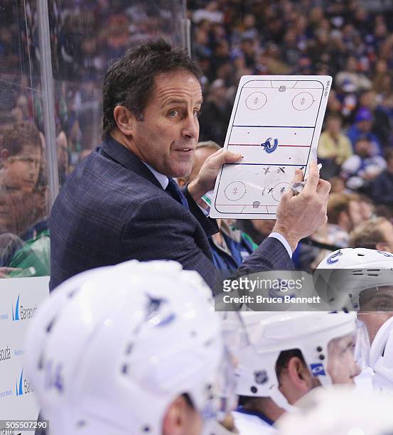 Assistant coach Doug Lidster give players instructions during the third period against the New York Islanders at the Barclays Center on January 17,...