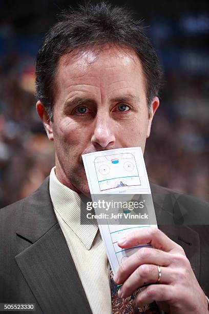 Assistant coach Doug Lidster of the Vancouver Canucks looks on from the bench during their NHL game against the Florida Panthers at Rogers Arena...