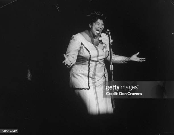 Singer Mahalia Jackson singing at Shrine Auditorium.