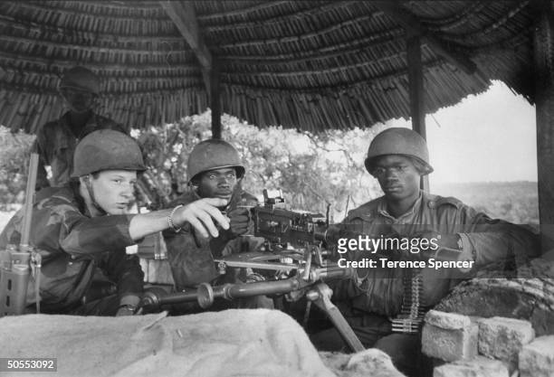 Katanga Army troops with white mercenary soldier serving in Katanga Forces.