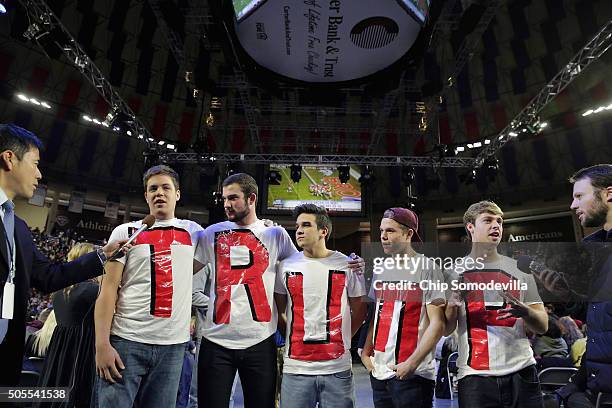 Liberty University students Austin Miller, James Ford, Jeremy Boyd, Josiah O'Boyle and Cody Hildebrand wear home made t-shirts spelling 'TRUMP' while...