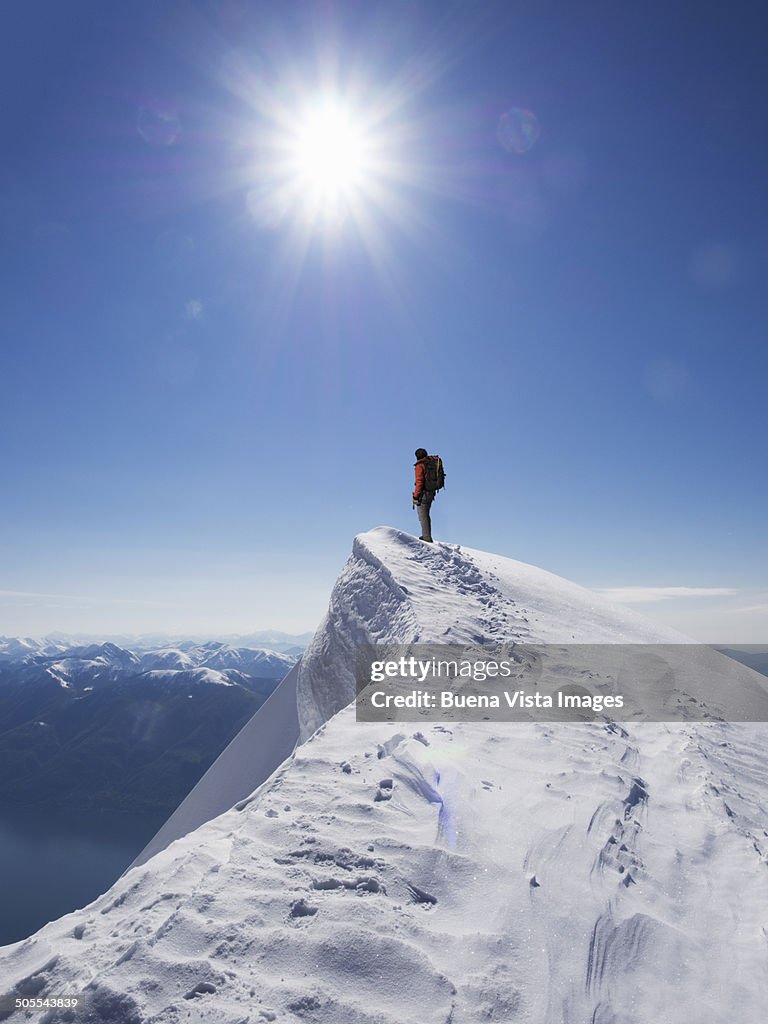 Lone climber on the top of a  mountain