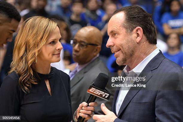 Head coach Mike Brey of the Notre Dame Fighting Irish is interviewed by ESPN reporter Shannon Spake following the game against the Duke Blue Devils...