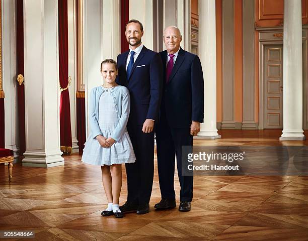 In this handout photo provided by the Royal Court, Princess Ingrid Alexandra of Norway, Crown Prince Haakon of Norway and King Harald V of Norway...