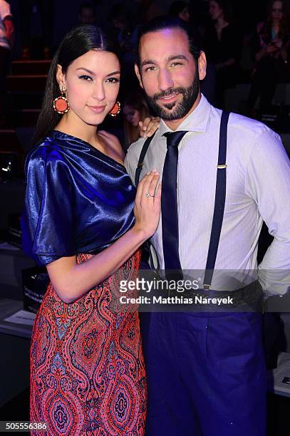 Host Rebecca Mir and Massimo Sinato attend the 'The Power Of Colors - MAYBELLINE New York Make-Up Runway' show during the Mercedes-Benz Fashion Week...