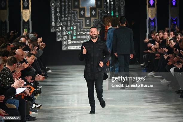 Designer Marcelo Burlon acknowledges the applause of the public after the Marcelo Burlon County Of Milan show during Milan Men's Fashion Week...