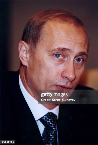 Russian PM Vladimir Putin in serious portrait during session of State Duma.