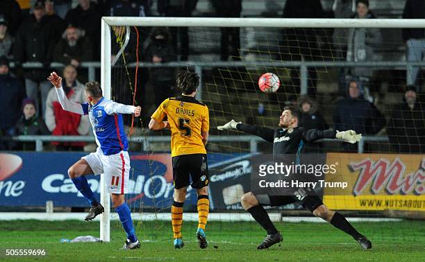 Jordan Rhodes of Blackburn Rovers scores his sides second goal during the Emirates FA Cup Third Round match between Newport County and Blackburn...