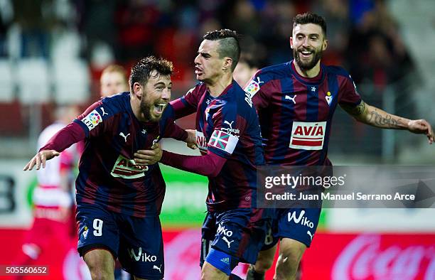 Sergi Enrich of SD Eibar celebrates with his teammates Daniel Garcia SD Eibar after scoring his team's third goal during the La Liga match between SD...