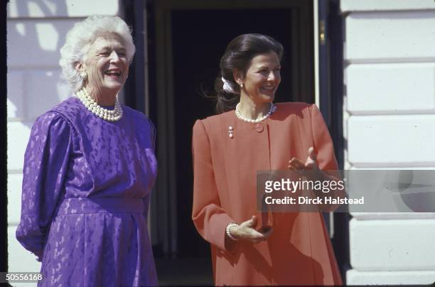 Mrs. George H. W. Bush, looking healthy after treatment for the thyroid disorder Graves' Disease, at White House hosting Queen Sylvia of Sweden.