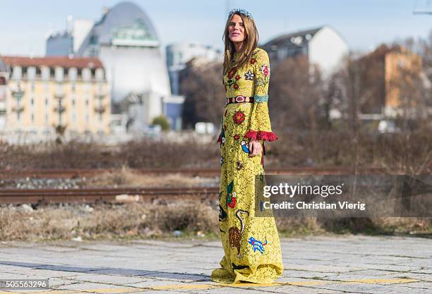 Anna dello Russo wearing a Gucci Cruise 2016 dress outside Gucci during Milan Men's Fashion Week Fall/Winter 2016/17 on January 18 in Milan, Italy