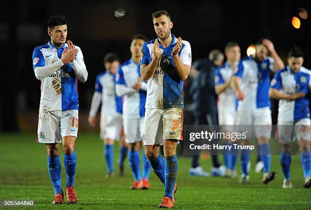 Ben Marshall of Blackburn Rovers and Tommy Spurr of Blackburn Rovers applaud the travelling fans during the Emirates FA Cup Third Round match between...