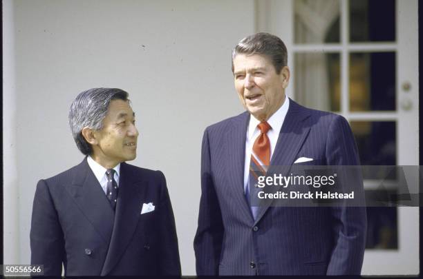 Pres. Ronald W. Reagan standing outside White House with Japan's Crown Prince Akihito.