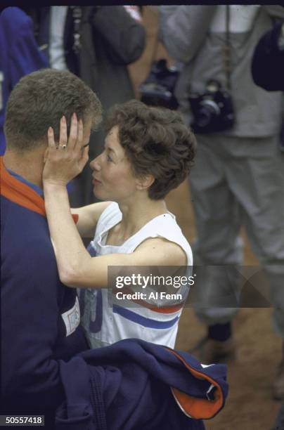 Ann Packer of Britain with fiance and captain of the UK team Robibe Brightwell at Summer Olympics, Tokyo, 1964.