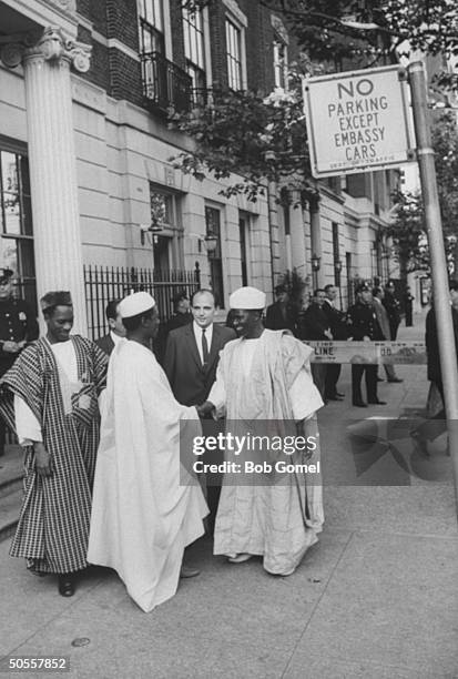 Guinea officials arriving at the Soviet Embassy, for an Afro-Asian luncheon.
