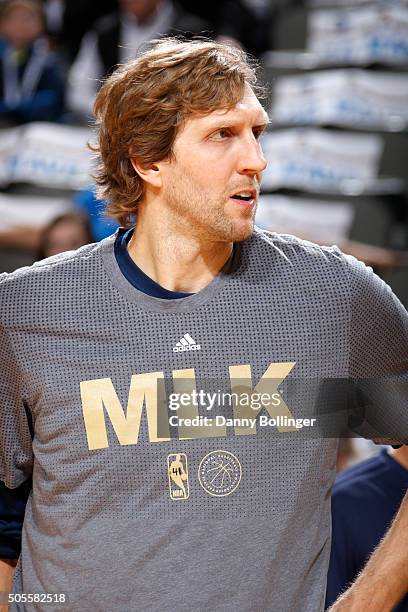 Dirk Nowitzki of the Dallas Mavericks wears a special shooting shirt in remembrance on Martin Luther King Jr. Day against the Boston Celtics on...