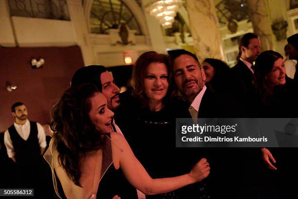 Marc Jacobs and Sandra Bernhard pose for a photo with guests as they attend Marc Jacobs Beauty Velvet Noir Mascara Launch Dinner on January 18, 2016...