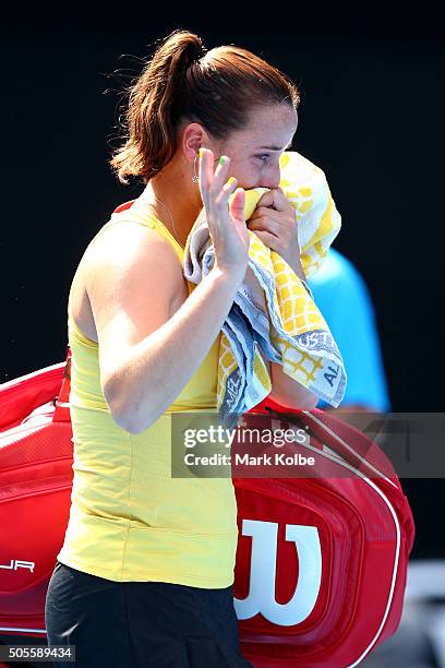 Jarmila Wolfe of Australia show her emotion after retiring from her her first round match against Anastasija Sevastova of Latvia during day two of...