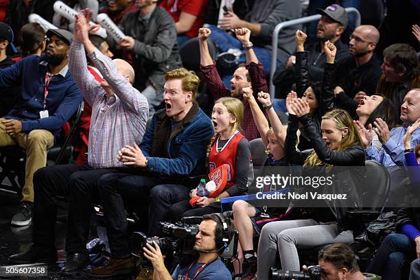 Steve Ballmer, Conan O'Brien, Neve O'Brien, Beckett O'Brien and Liza Powel attend a basketball game between the Houston Rockets and the Los Angeles...