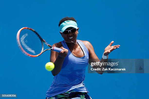 Victoria Duval of the United States plays a forehand in her first round match against Elina Svitolina of Ukraine during day two of the 2016...