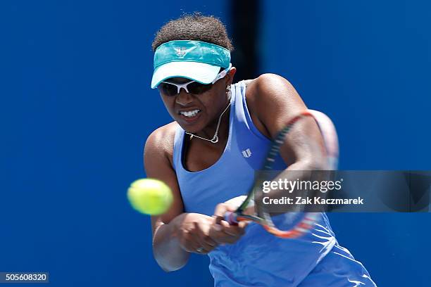 Victoria Duval of the United States plays a backhand in her first round match against Elina Svitolina of Ukraine during day two of the 2016...