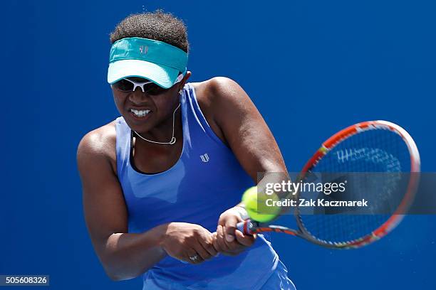 Victoria Duval of the United States plays a backhand in her first round match against Elina Svitolina of Ukraine during day two of the 2016...