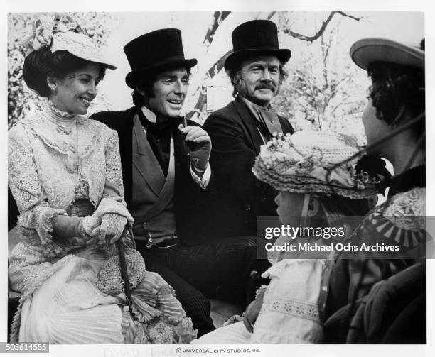 Barbara Parkins, David Birney and Steve Forrest walk in a scene for the TV-Mini Series "Testimony of Two Men", circa 1977.