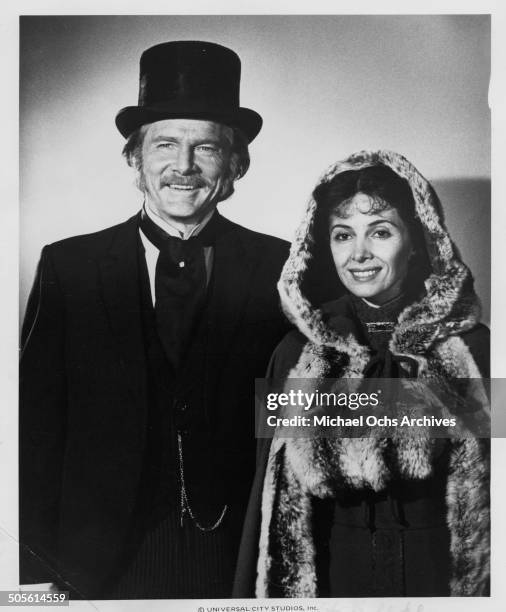Steve Forrest poses with Barbara Parkins in a scene for the TV-Mini Series "Testimony of Two Men", circa 1977.