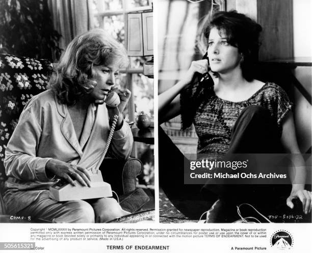Shirley MacLaine talks on the phone Debra Winger listens on the phone in a scene from the Paramount Pictures movie "Terms of Endearment", circa 1983.