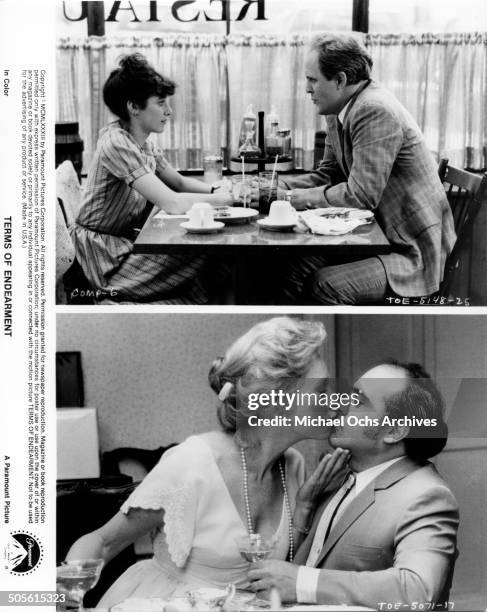 Debra Winger meets with John Lithgow in a diner Shirley MacLaine kisses Danny DeVito in a scene from the Paramount Pictures movie "Terms of...