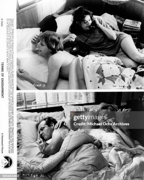 Debra Winger talks on the phone as Jeff Daniels listens Shirley MacLaine talks on the phone as Jack Nicholson sleeps in a scene from the Paramount...