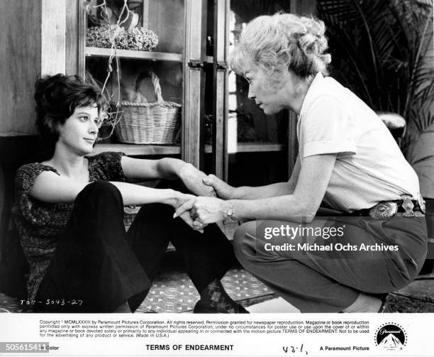 Debra Winger and Shirley MacLaine share a mother-daughter moment in a scene from the Paramount Pictures movie "Terms of Endearment", circa 1983.