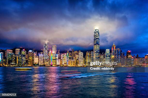 hong kong financial district at twilight - victoria harbour hong kong stock pictures, royalty-free photos & images