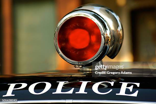 gumball light on top of an old police car - hatboro imagens e fotografias de stock