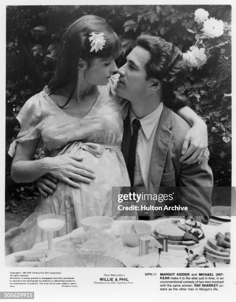 Margot Kidder sits on Michael Ontkean lap in a scene from the 20th Century Fox movie "Willie & Phil" circa 1980.