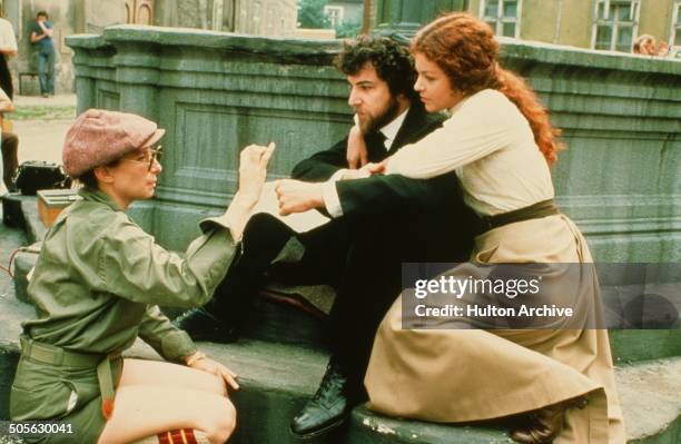 Barbra Streisand directs Mandy Patinkin and Amy Irving in a scene in the movie "Yentl" circa 1983.