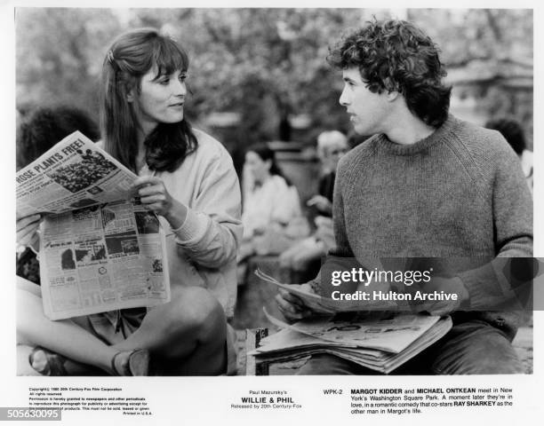 Margot Kidder and Michael Ontkean meet as they read news papers, in a scene from the 20th Century Fox movie "Willie & Phil" circa 1980.