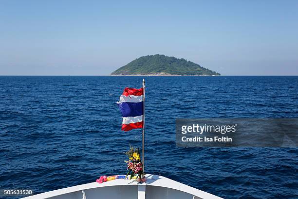 Thai flag on a Liver boat on January 05, 2015 in Similan Islands, Thailand.