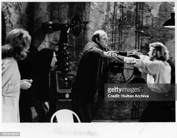 Peter Boyle dances with Gene Wilder in a scene from the movie "Young Frankenstein" circa 1974.