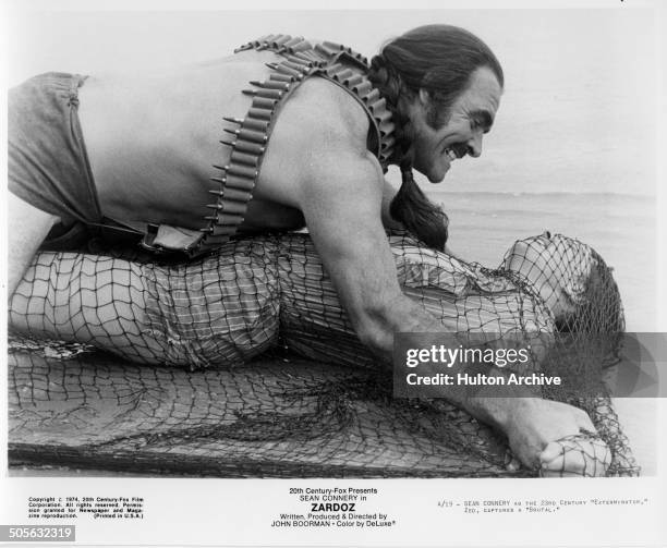 Sean Connery captures a woman in a scene from the 20th Century Fox movie "Zardoz" circa 1974.