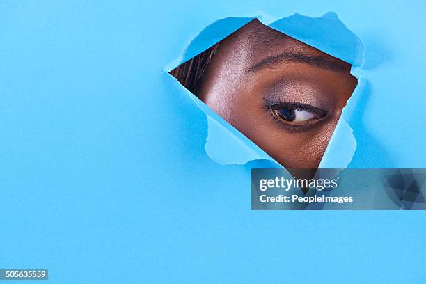 what's that down there? - peeping holes stock pictures, royalty-free photos & images