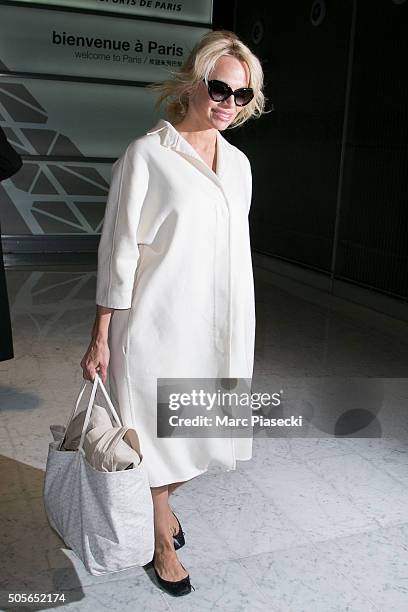 Pamela Anderson arrives at Charles-de-Gaulle on January 19, 2016 in Paris, France.