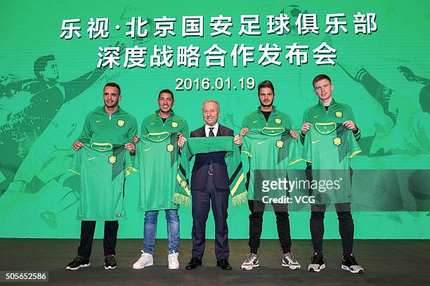 Renato Augusto, Ralf, head coach Alberto Zaccheroni, Kleber and Egor Krimets of Beijing Guoan attend a press conference on January 19, 2016 in...