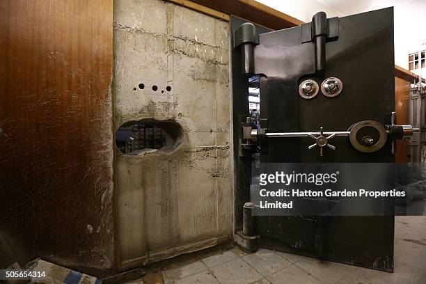 Hole is pictured after having been re-drilled in the wall used by burglars to access the underground vault of the Hatton Garden Safe Deposit Company...