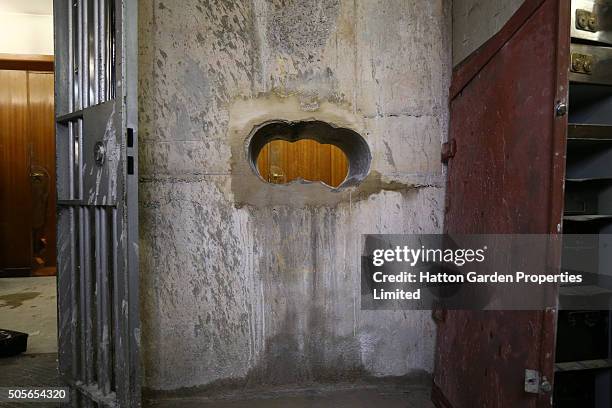 Hole is pictured after having been re-drilled in the wall used by burglars to access the underground vault of the Hatton Garden Safe Deposit Company...