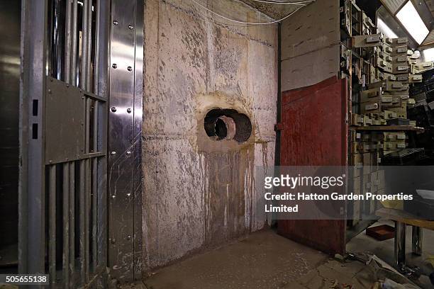 Hole is pictured after having been re-drilled in the wall used by burglars to access the underground vault of the Hatton Garden Safe Deposit Company...