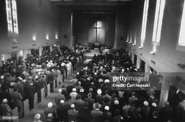 Funeral service for murdered members of Clutter family.