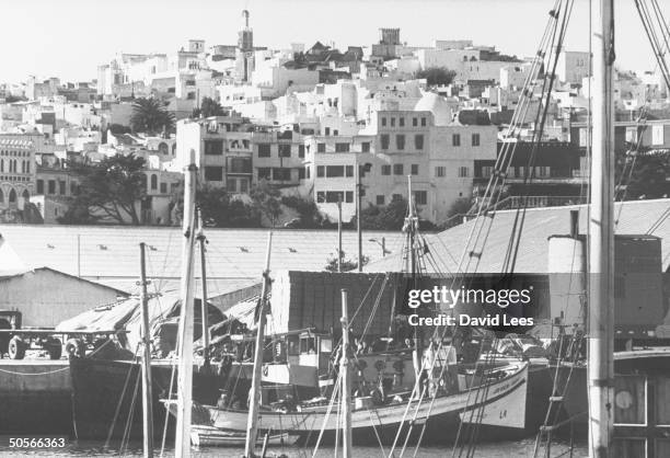 Smugglers unloading ships at harbor.