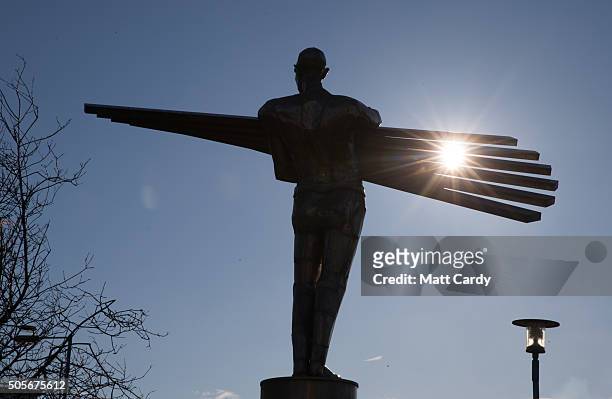 The sun shines on a statue celebrating the steel industry erected close to the Tata steelworks on January 19, 2016 in Port Talbot, Wales. Tata Steel...